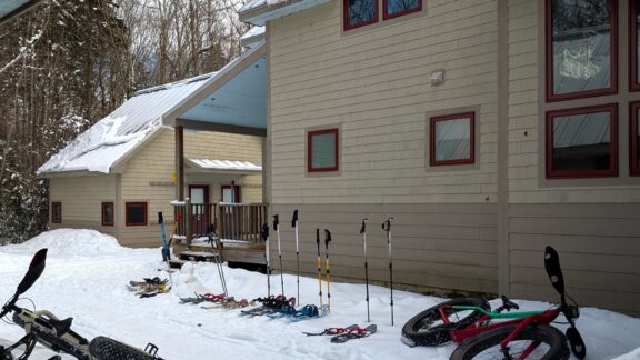 Snowshoes and fat bikes outside of Poplar Stream Hut.