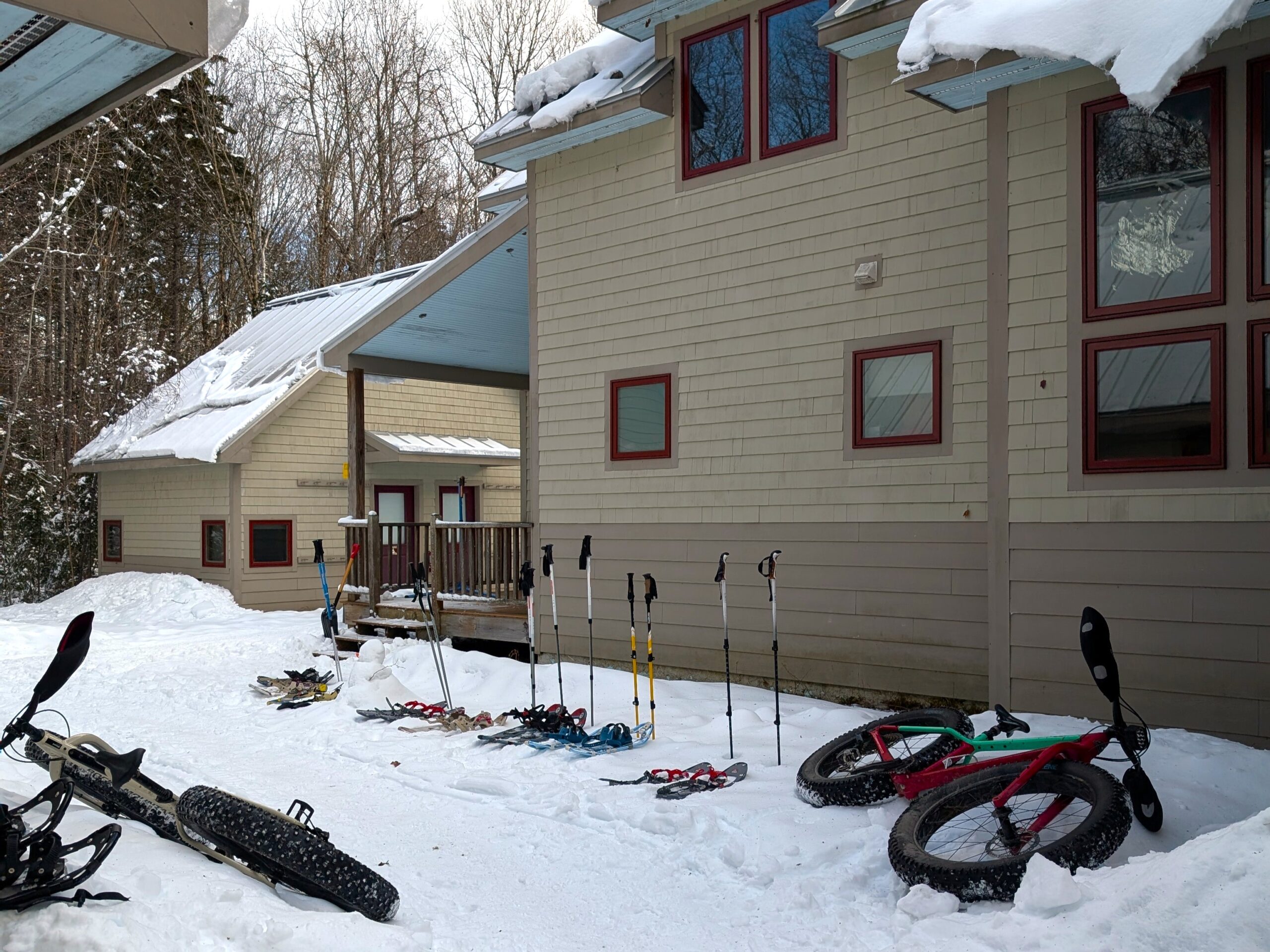 Snowshoes and fat bikes outside of Poplar Stream Hut.