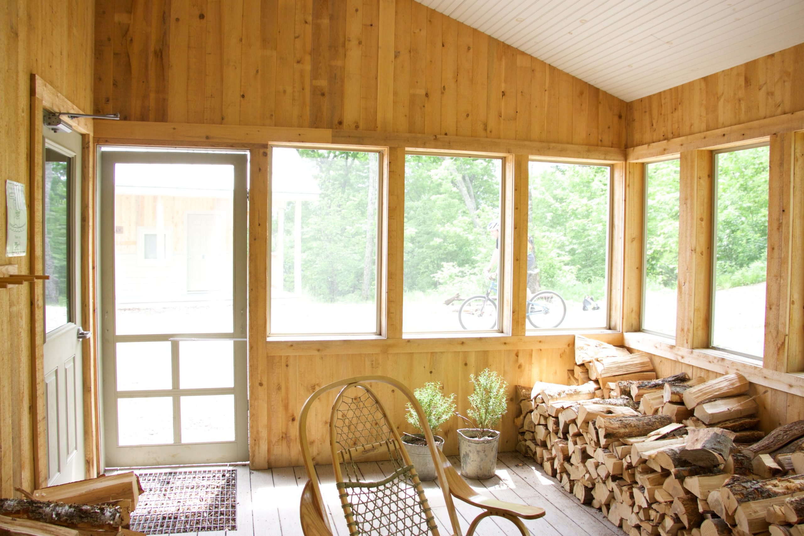View from inside the Stratton Brook Hut screened porch.
