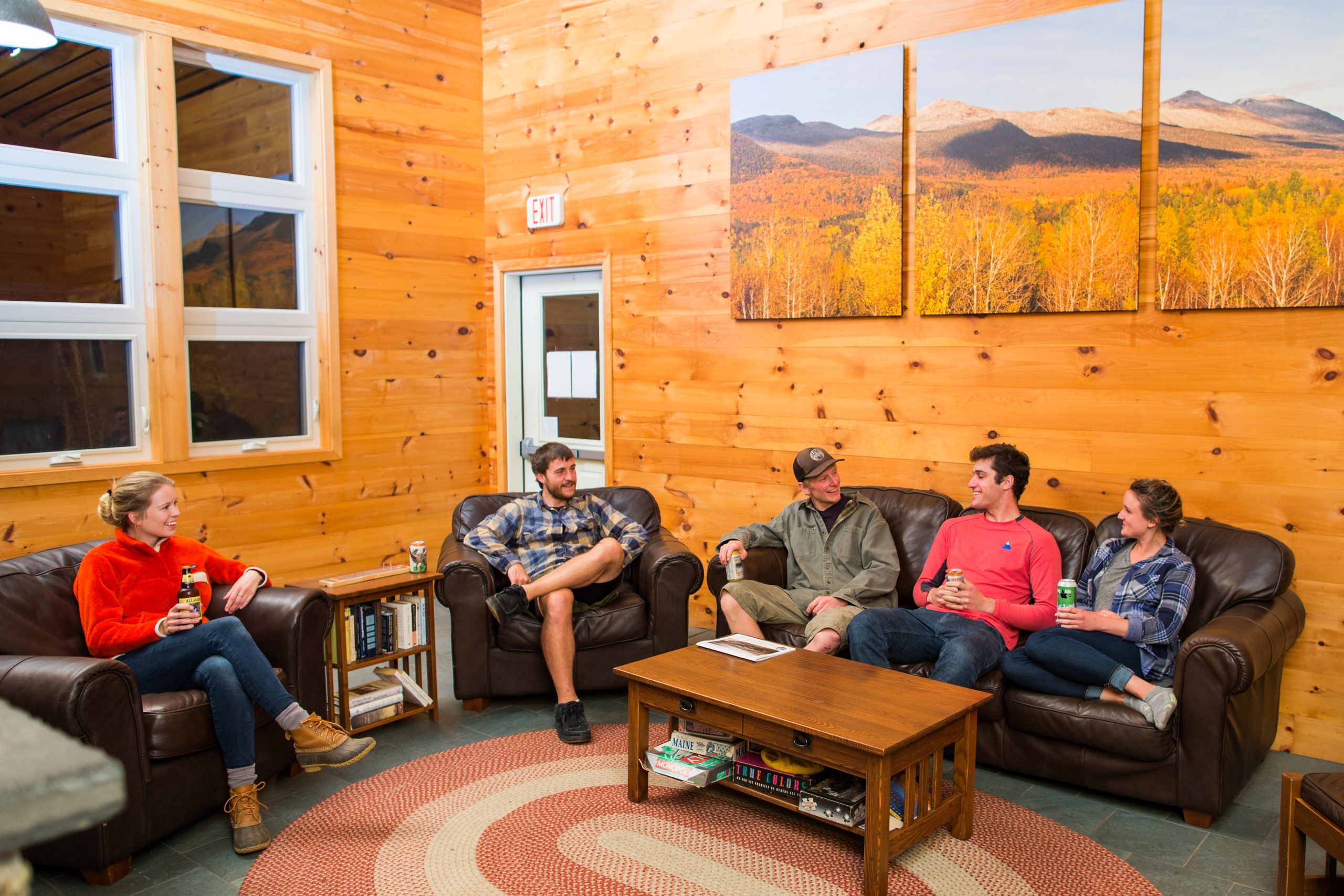 Guests relaxing on leather couches