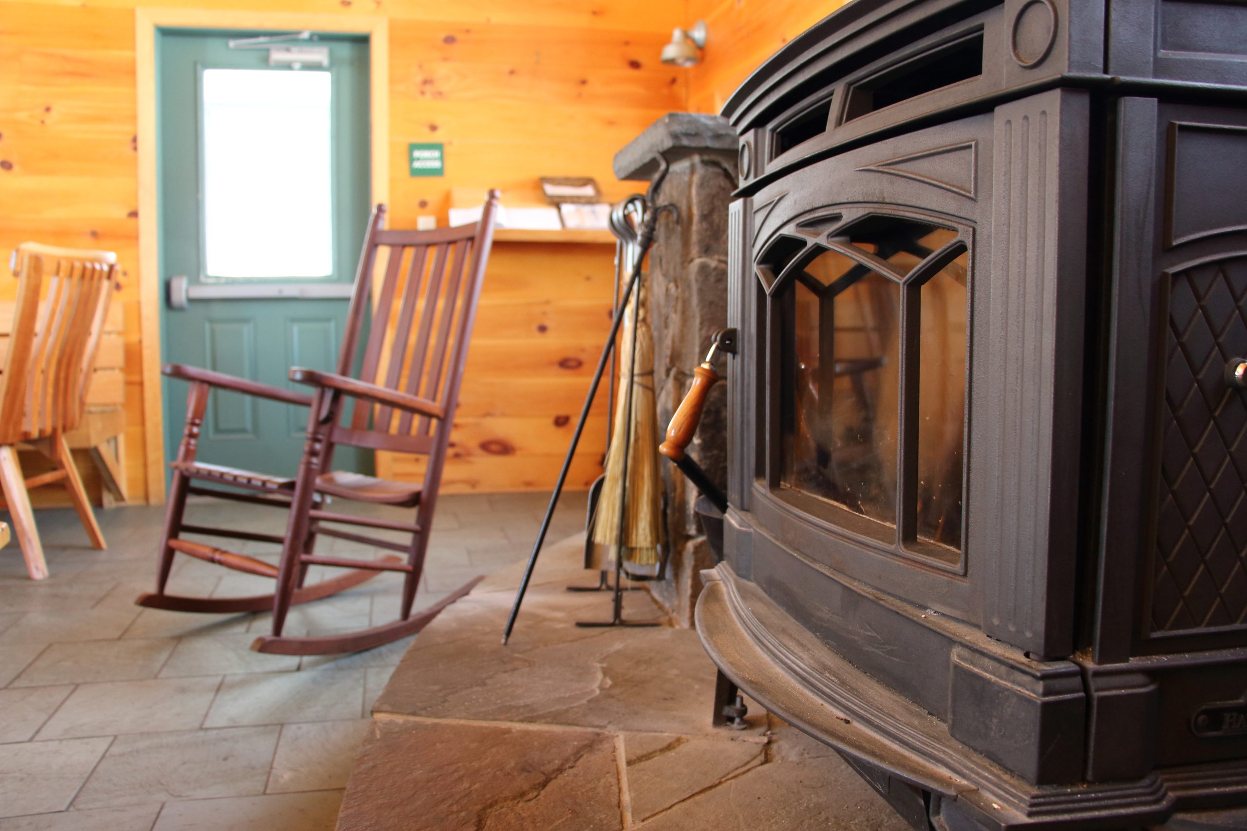Woodstove and rocking chair at Flagstaff Lake Hut.