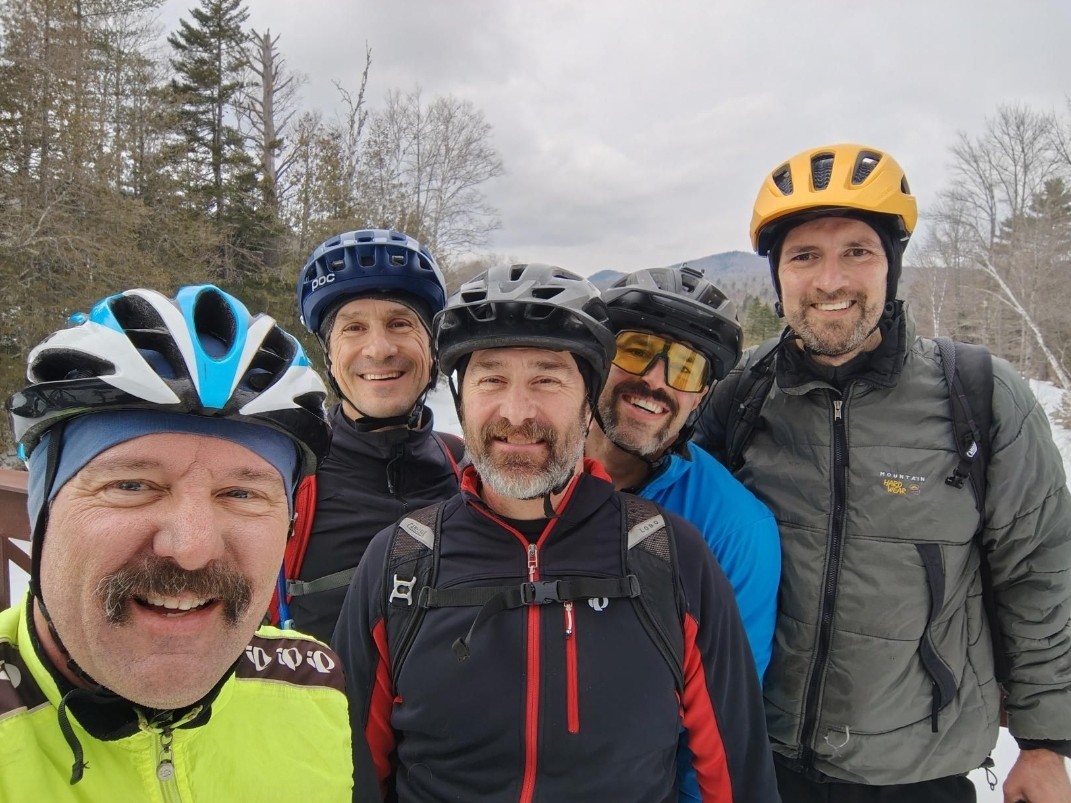 A group of happy fat bikers in winter.