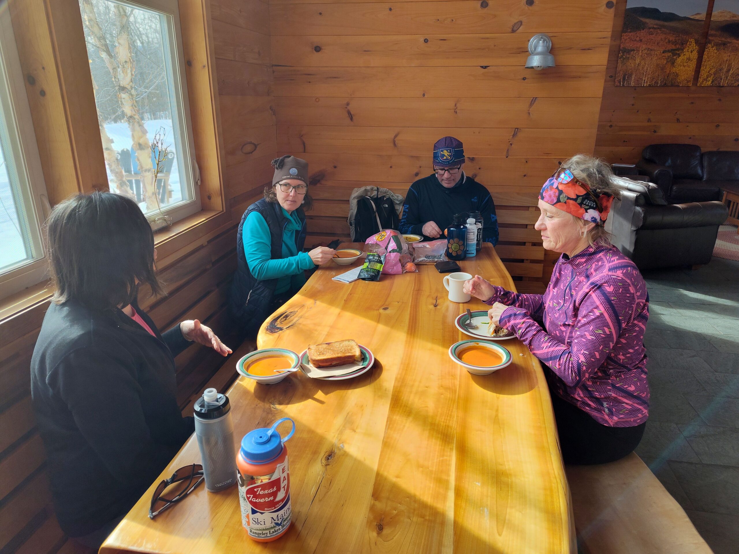 Weekend visitors having lunch at Stratton Brook Hut.